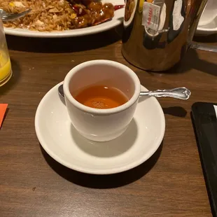 a cup of tea on a saucer