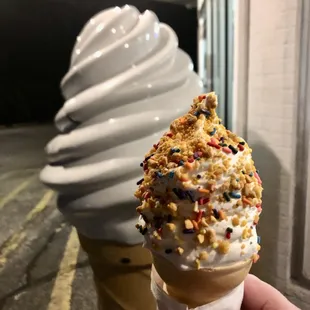 an ice cream cone with sprinkles