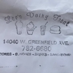 a piece of paper with the name lee's dairy treat written on it
