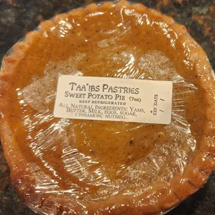 a pie wrapped in plastic