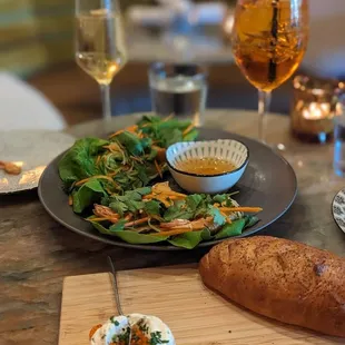 Champagne spritz, Capaletti spritz Japanese butter with smoked trout caviar and fresh bread Shrimp lettuce wrap