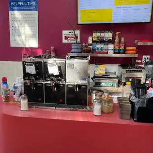 a counter with a coffee machine