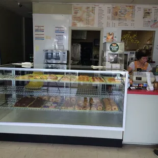 a woman behind the counter