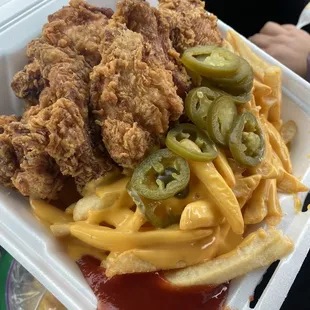 6 piece chicken strips with cheese fries.