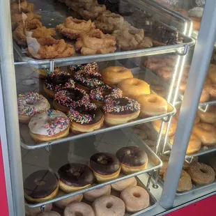 a display case full of donuts