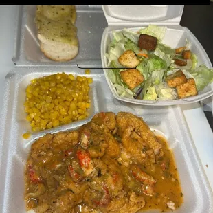 Catfish Lousianne - (Fried) Catfish topped with Crawfish Etouffee and side (corn) and salad