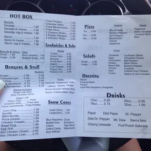 a person holding a menu