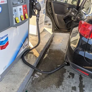a car at a gas pump