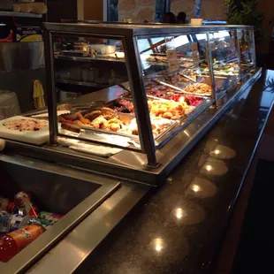 a buffet with a variety of food items