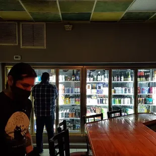 a man standing in front of a counter