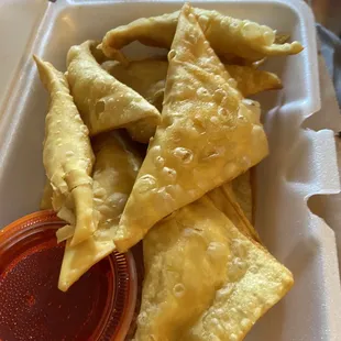 a close up of some food in a styrofoam container