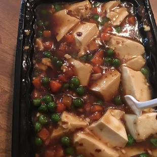 Tofu  with veggies Szechuan Style* with frozen peas and carrots VERY Disappointed !