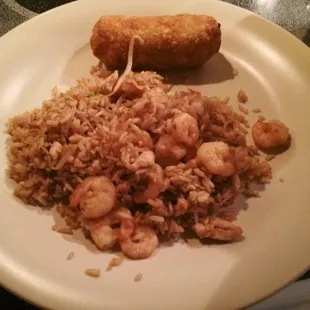 Brought home some carry out tonight from Lee&apos;s Kitchen...this is special fried rice with chicken and shrimp with egg rolls.
