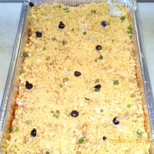 a pan of rice and olives