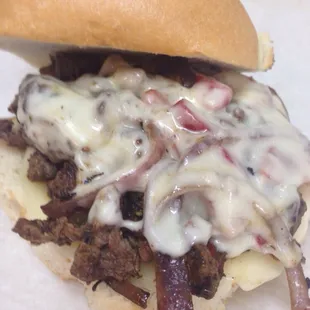 Cooper's cheesesteak. Prime beef, onions, peppers and provolone cheese.