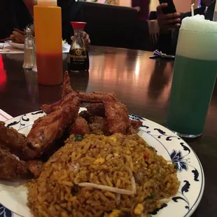 a plate of fried chicken and rice