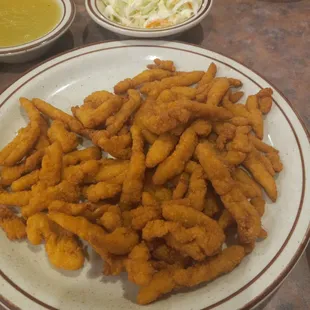 a plate of deep fried chicken nuggies