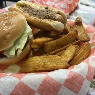 Cajun filet with potato wedges and chili hot dog
