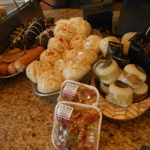 Various treats including banana leaf wrapped pork bun