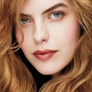 a close up of a woman's face