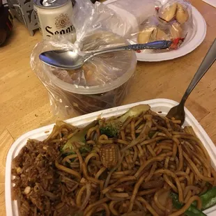 a plate of noodles and vegetables