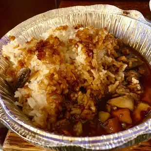 This is how much rice was left after I ate the Hunan beef--about half the container.