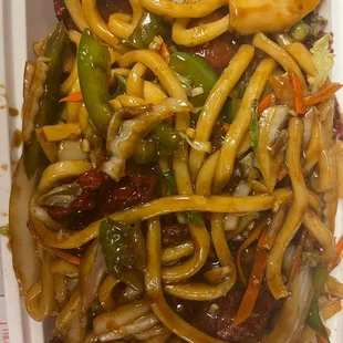a plate of noodles and vegetables