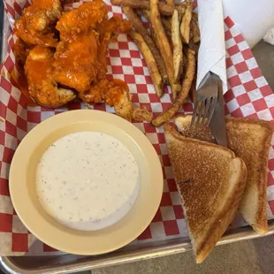 Buffalo chicken tenders, fries, toast, and ranch.
