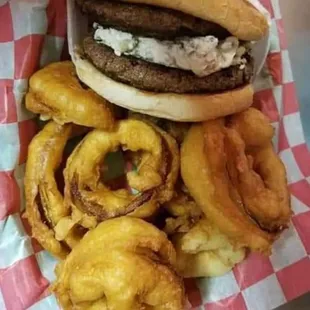 a hamburger and onion rings