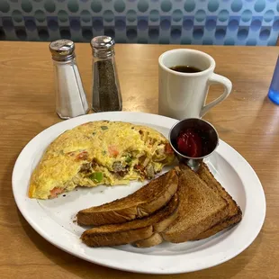 Farmer's Omellette with wheat toast and strawberry preserves.