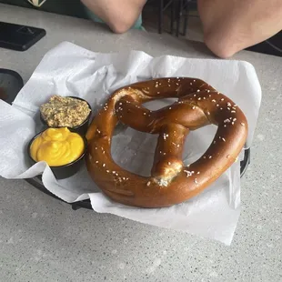 Pretzel with cheese and mustard
