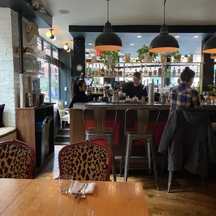 Bar seating in addition to tables and booths