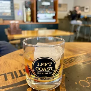 a glass of left coast