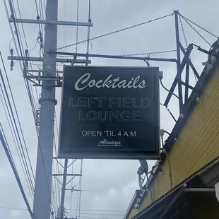 the neon sign for the restaurant