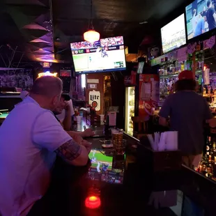 a man sitting at the bar