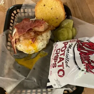 a sandwich and chips in a basket