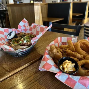 Potato skins and onion rings with Cajun mayo