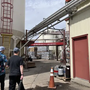 two men walking down the street