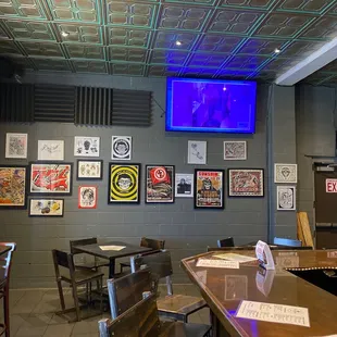 a bar with tables and chairs