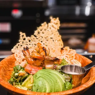 Leftcraft Salad -- mixed greens, shrimp, scallops, wild caught coho salmon with citrus chermoula, lemon remoulade, avocado, &amp; parmesan crisp