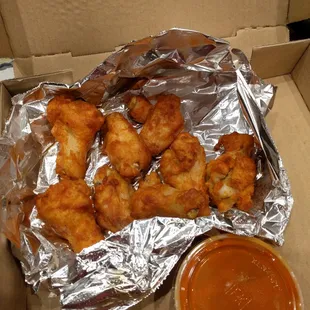 Buffalo wings.  You can see the softness in the skin from being baked, but you can't really see how tiny these are.