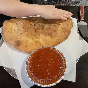 Monster calzone with sauce