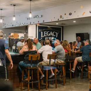 Main taproom. Multiple types of seating options throughout including high-top / bar seating, low seating and lounge seating.