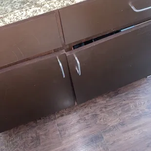 Broken cabinet... again