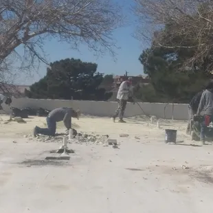a group of men working on a construction site