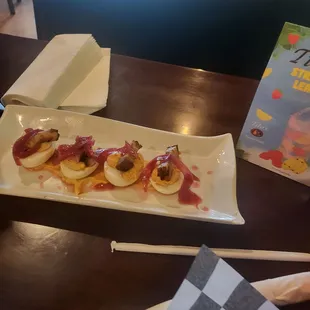 Delicious deviled eggs with pork belly