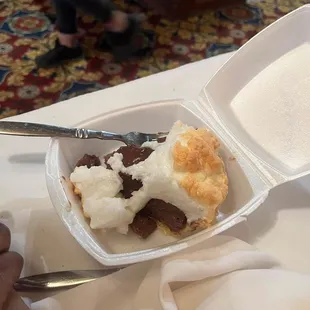 a container of ice cream with a spoon in it