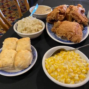 Chicken, biscuits, coleslaw potatoes and gravy