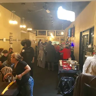 a large group of people sitting at tables