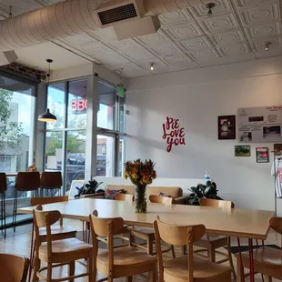 a dining room with a table and chairs